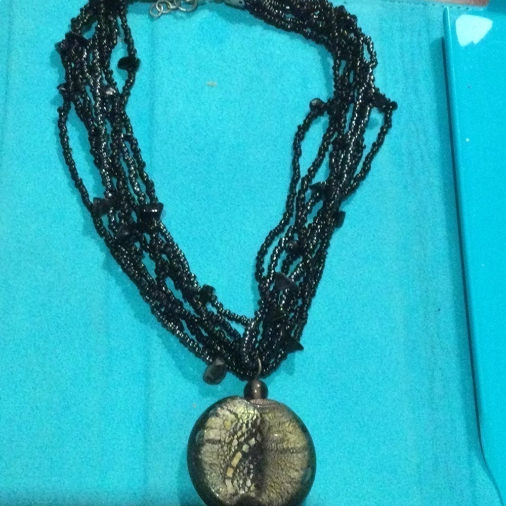 Beaded black necklace with glass pendant